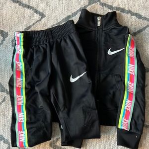 Nike zip tracksuit set with fluorescent stripes. Size 2T